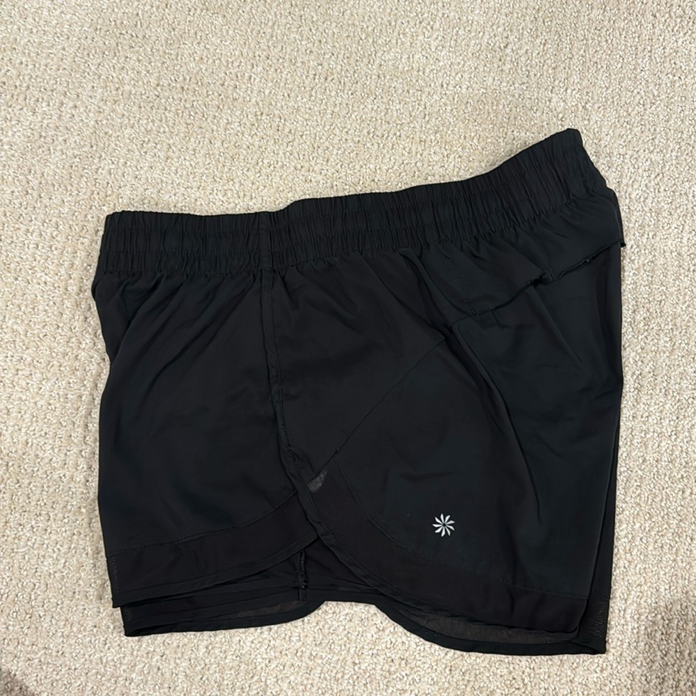 Athleta mesh racer run short 4 size M. Zipper stash pocket.